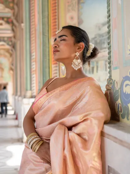 Another beautiful shot of our baby pink Banarasi silk saree. The traditional weave and soft color are timeless.