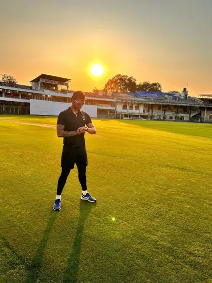 On the field at sunset. It's important to focus on your own journey and progress, as comparison is often the thief of joy.