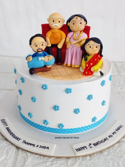 This cake is a tribute to family. I recreated a cherished family photo in fondant, capturing four family members in a single, heartwarming scene for a joint anniversary and birthday celebration.