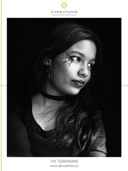 Another angle of our spider-web Halloween makeup, showing how a simple, artistic touch can create a powerful and memorable themed look.
