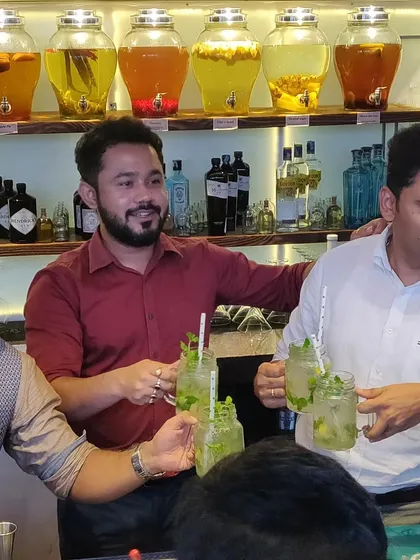 Cheers to a successful workshop. The final and most important step is always enjoying the delicious cocktails you've learned to create together.