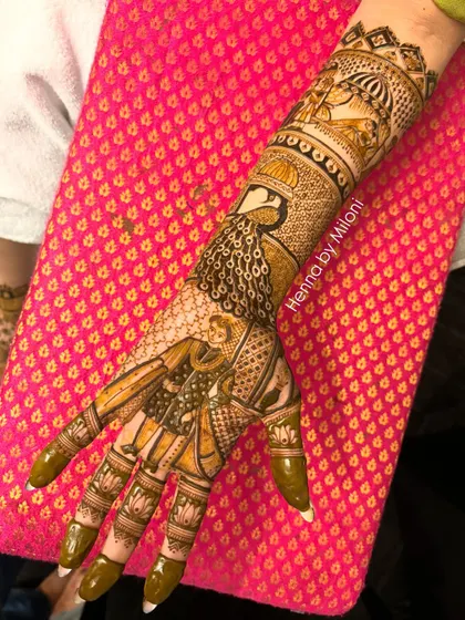 A close-up of a bridal mehendi featuring a portrait of the bride. The design also includes a peacock and a doli scene, telling the story of her wedding day.