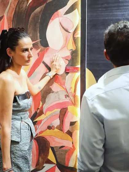 Mandana Karimi exploring the vibrant, artistic 'Wall & Deco' mural at our Ajio Luxe Weekend showcase. Her presence added a touch of star power to the event.