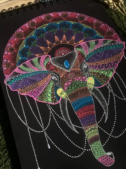 A majestic elephant adorned with intricate mandala and zentangle patterns. This piece combines the strength of the elephant with the spiritual balance of the mandala.