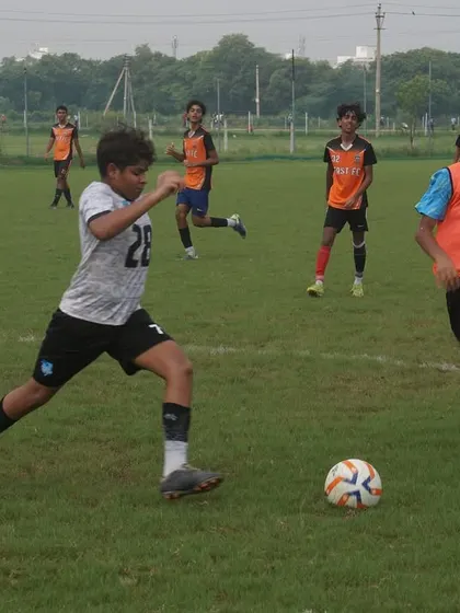 Our U16 players in a midfield battle during the RSA Cup. This demonstrates the physical and tactical challenges of competitive matches.