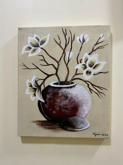 This still life painting of flowers in a vase was done with acrylics. It’s a great example of how we can create realistic textures and shading on canvas.
