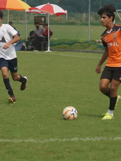 An attacker from our U16 team dribbling at speed during the RSA Cup.