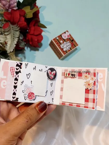 Another example of a tiny accordion scrapbook, this one with a pink and black love theme.