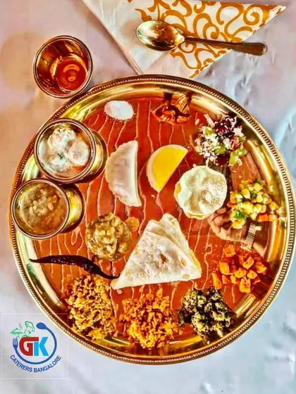 Elegant Thali Presentation: For a different style of service, we also offer our authentic South Indian meals in an elegant brass thali. It provides a royal touch to the dining experience.