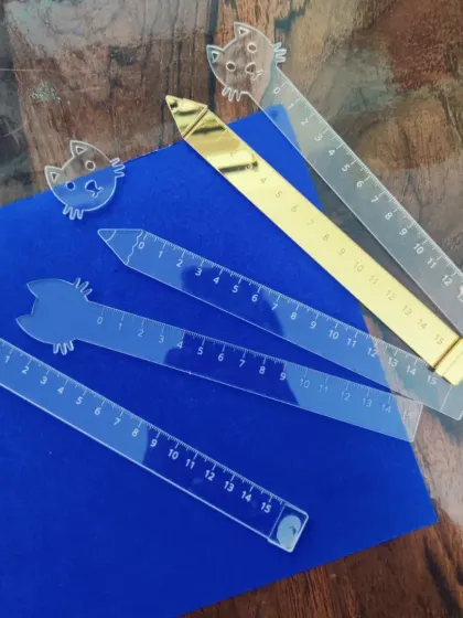 The finished products from our laser cutting prototype session. These custom-designed, cat-themed acrylic rulers are a great example of the unique and personalized stationery we can create for individuals or as branded merchandise.