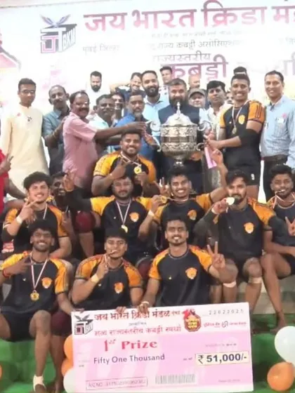 Another angle of our team with the championship trophy, a testament to our collective effort and training.