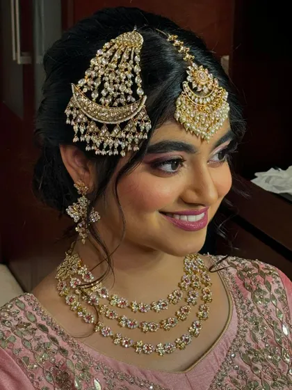 A profile shot showcasing the beautiful smile and radiant skin of this engagement bride.