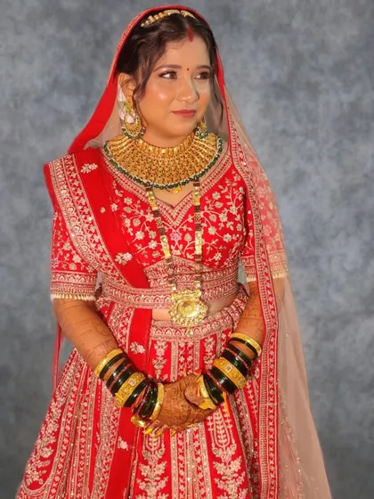 Urmila looking elegant and poised, ready for her reception.