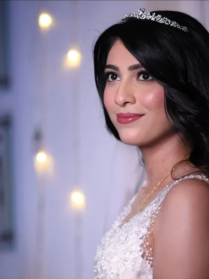 A simple and elegant portrait. This bride's look is all about clean lines, soft makeup, and letting her natural beauty shine.