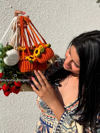 Showing off both our strawberry and sunflower hanging pot charms. These are some of our most unique decorative items and make for a very special handmade gift.