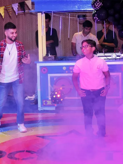 The birthday boy takes over the dance floor with a professional entertainer. I can arrange for DJs and dancers to get the party started and teach guests some cool moves.