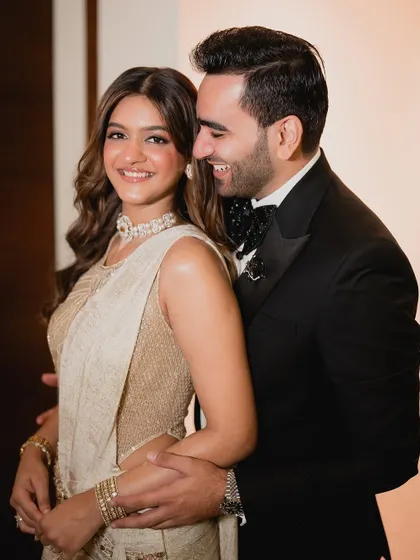 The look of love. This photo captures the joy of the couple, with the bride looking effortlessly glamorous in her engagement attire.