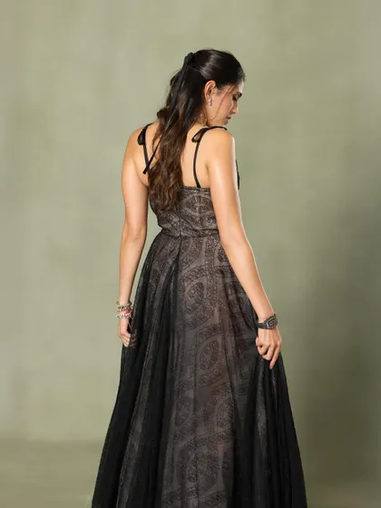 A back view of the Giambattista Valli gown, highlighting the simple straps and the flowing silhouette.