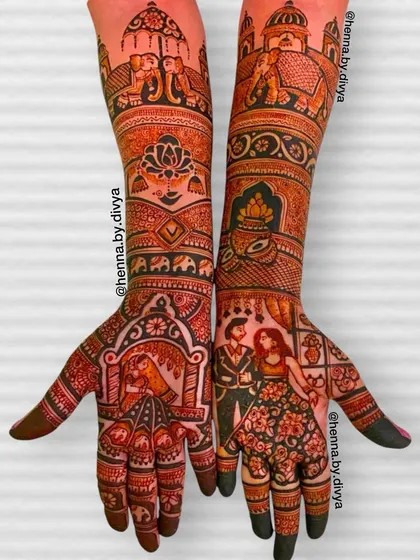A grand bridal design featuring a couple portrait and a peacock on the palms. The arms depict a royal procession with elephants and palace architecture.