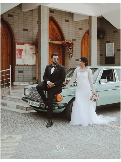 Classic elegance for a timeless love story. A vintage car adds a touch of sophisticated charm to this Christian wedding, showcasing how I can source luxury rides to perfectly match the theme of your day.