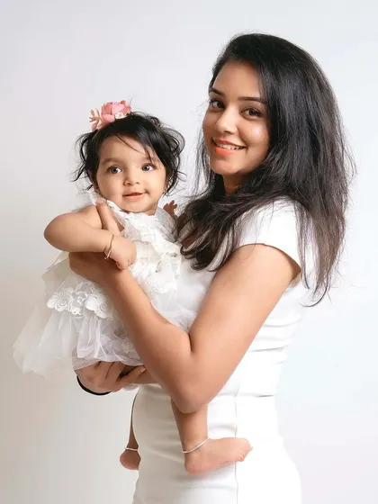 Another lovely shot of this mother and daughter, capturing a precious, gentle moment.