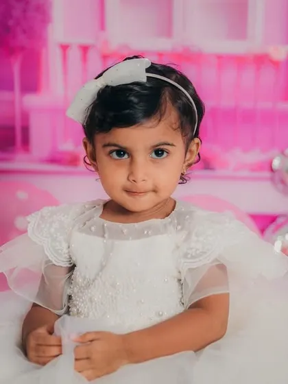 Posing perfectly for her second birthday photos. This little girl truly embodied the spirit of a princess.