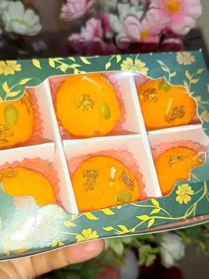 A beautifully packaged box of Ladoo candles, perfect for festivals like Rakhi or Diwali. I teach not just how to make candles, but also how to present them.