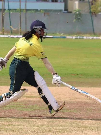 A batter sprints for a run, showcasing the speed and fitness required in the sport.