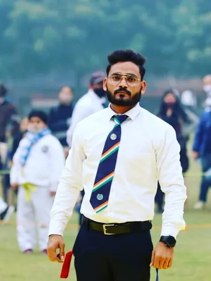 A moment during the 32nd Delhi State ITF Taekwon-do Championship, where I served as an official for the event.