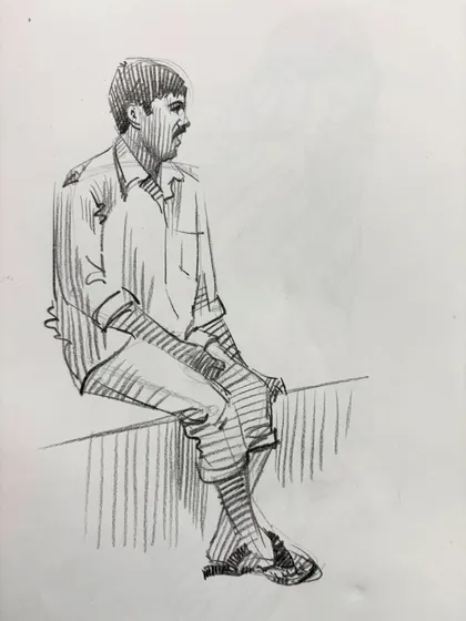 A sketch of a man sitting on a ledge, a simple study of a common pose.
