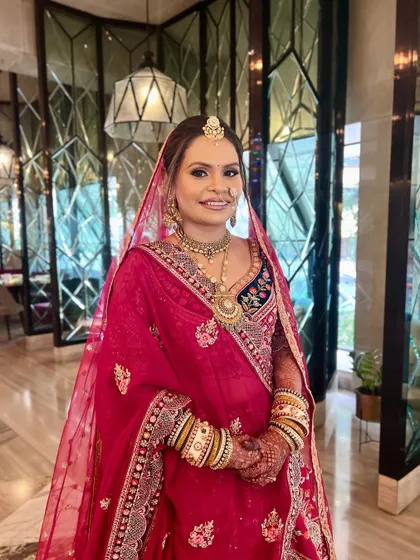 The complete bridal look, from the intricate hair to the flawless makeup. Every detail is considered to create a cohesive and stunning appearance.