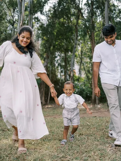 A family running and playing together. These "catch me if you can" sessions are always full of energy and laughter.