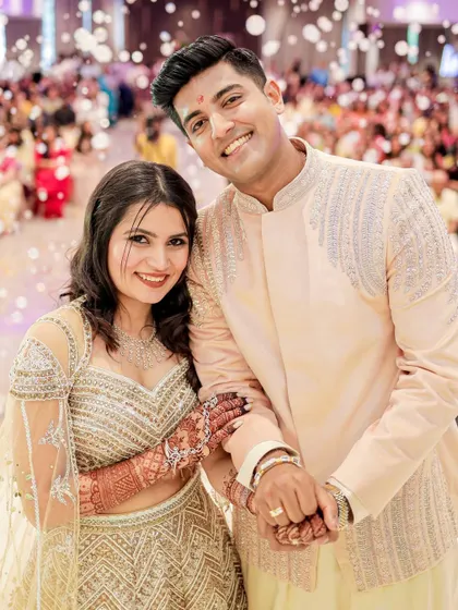The happy couple, ready to celebrate. Bhoomi's makeup is flawless and party ready.