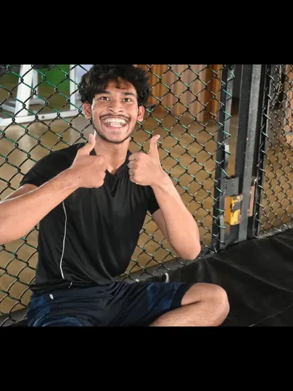 A student happy and relaxed after a tough BJJ session. We turn hugs into tap outs, but it's all love and respect afterward.
