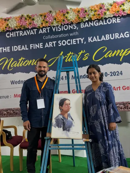 With the model after a portrait demonstration at a National Artist's Camp in Kalaburagi, Karnataka.