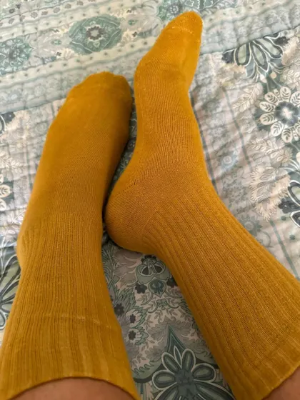 Wearing my cozy, naturally dyed socks. They are made from soft cotton, and the natural dye is gentle on the skin.