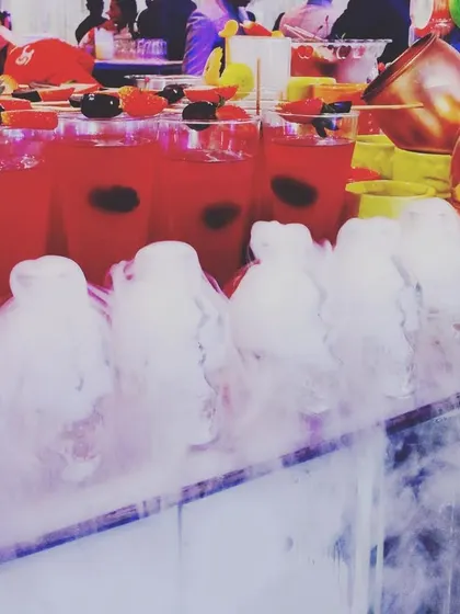 A full bar top enveloped in a thick cloud of dry ice. This is one of my favorite ways to create an immersive and mysterious atmosphere for themed events like Halloween or product launches.