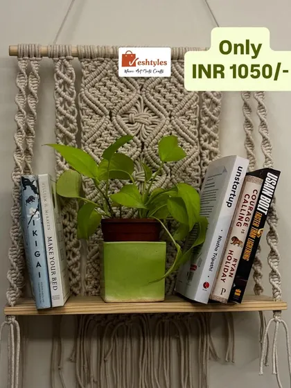 This beautiful and functional wall shelf is perfect for holding your favorite books and a small plant. The intricate macrame backdrop adds a lovely textural element to your wall. And what a deal!