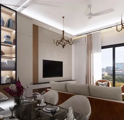 A modern classic living and dining space designed for our client in Vrindavan. The layout features an elegant dining set, a comfortable living area, and a beautifully lit crockery display, all tied together with sophisticated chandeliers.