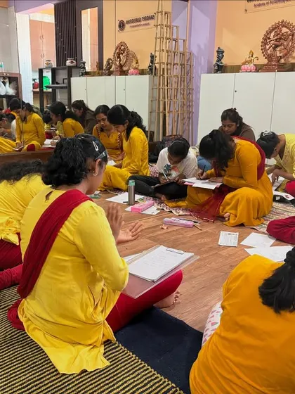 Another view of the theory examination in progress, showing the large number of students participating in the certification process.