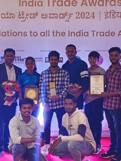 The joy of being recognized. Our team with their awards and flowers.