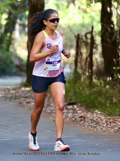 A steady rhythm on a forested path. Endurance running is about finding a sustainable pace and staying in the moment. My training teaches you how to listen to your body and manage your effort over long distances.