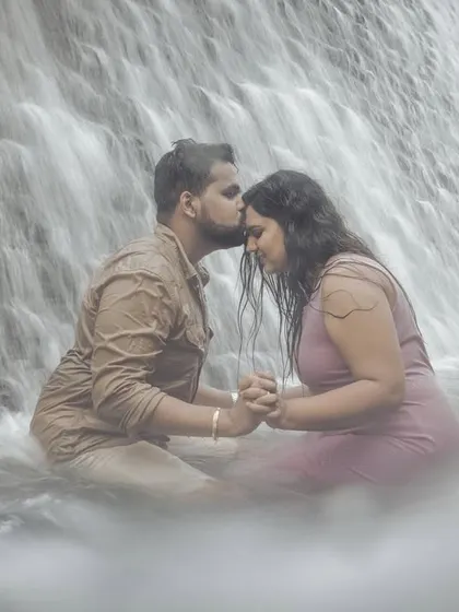 A tender moment shared amidst the power of a cascading waterfall. For adventurous couples, I find epic natural locations that provide a breathtaking setting for romantic engagement photography.