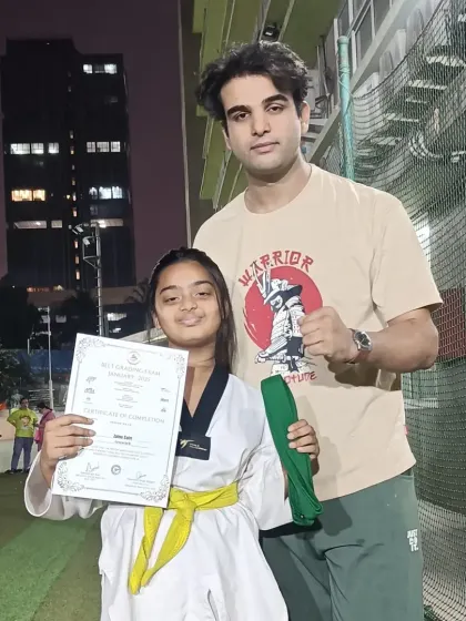 This young warrior has earned her green belt. Her journey is just beginning, and I know she will achieve great things.