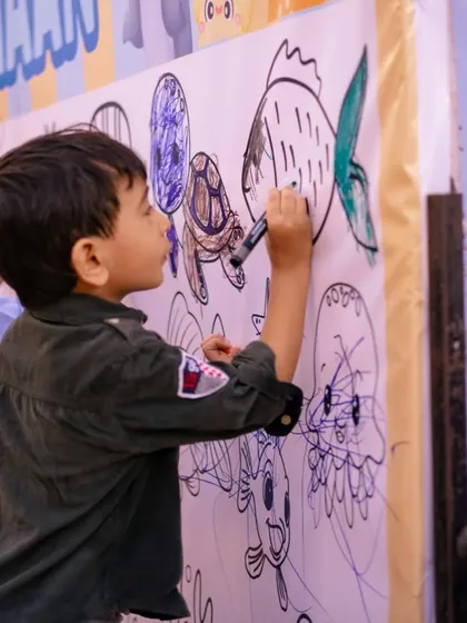 A giant coloring wall with an 'Under the Sea' theme, perfect for collaborative and creative fun.