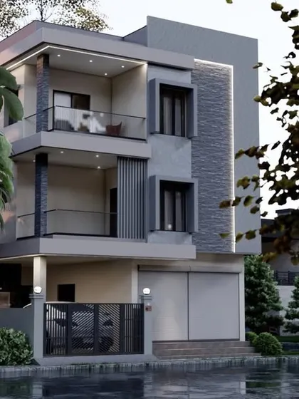 A simple yet elegant design for a multi-story home. The combination of grey stone cladding and smooth plaster gives the exterior a balanced and contemporary look.