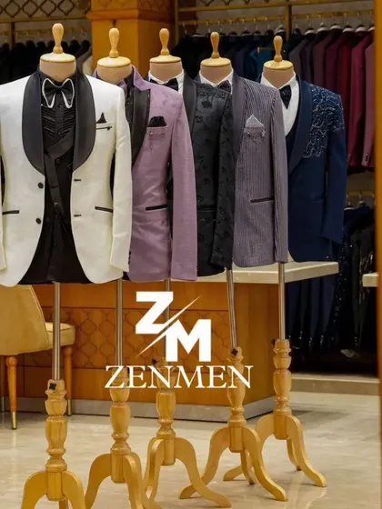 Another shot of the tuxedo collection, highlighting the white tuxedo with a black shawl lapel as the centerpiece.