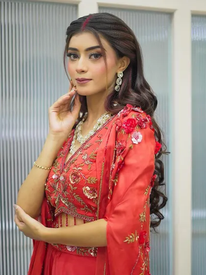 A close-up of the Karva Chauth makeup, highlighting the flawless skin and soft eye makeup. We aim to create looks that feel as good as they look, ensuring comfort throughout the day's rituals.