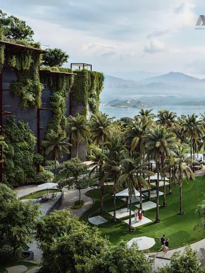 A view from the Westin Nashik, looking out over the lush landscape and water. The architecture is designed to frame these stunning views, enhancing the guest experience.