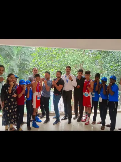 The whole team posing together. We train as a team and we celebrate as a team. This is our boxing family.